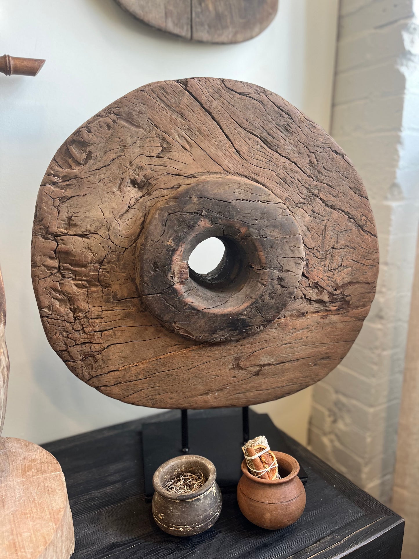 Antique cart wheel on stand